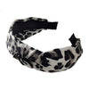 Serre tete leopard gris