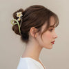 Pince cheveux fleur jaune