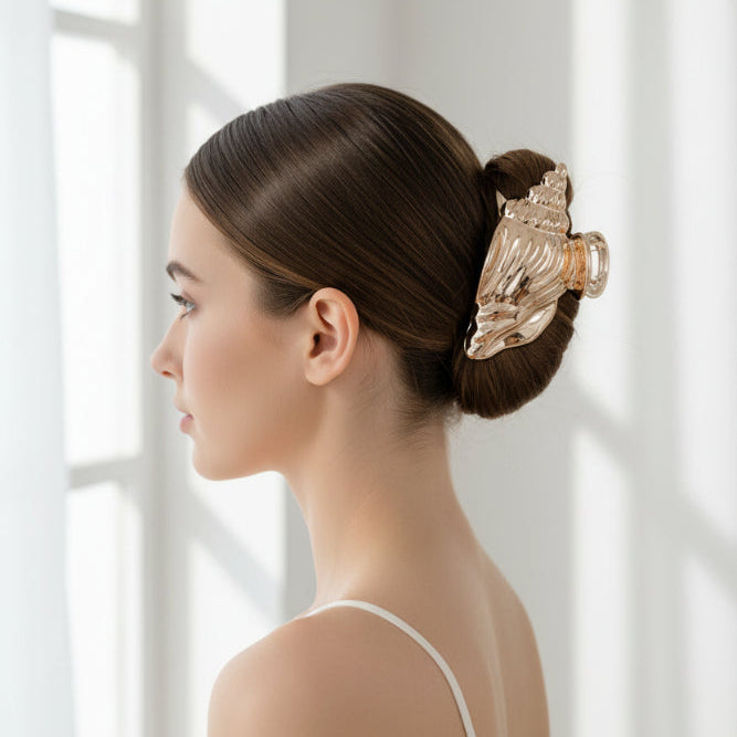 Pince cheveux dorée coquillage
