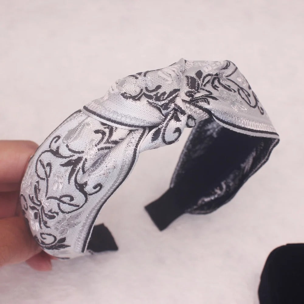 Serre tete fleurs blanc noir