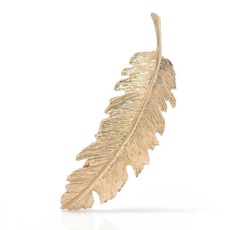 Barrette plume dorée