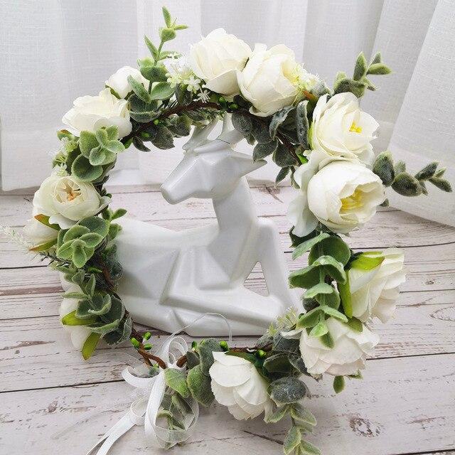 Couronne de fleurs cheveux blanc